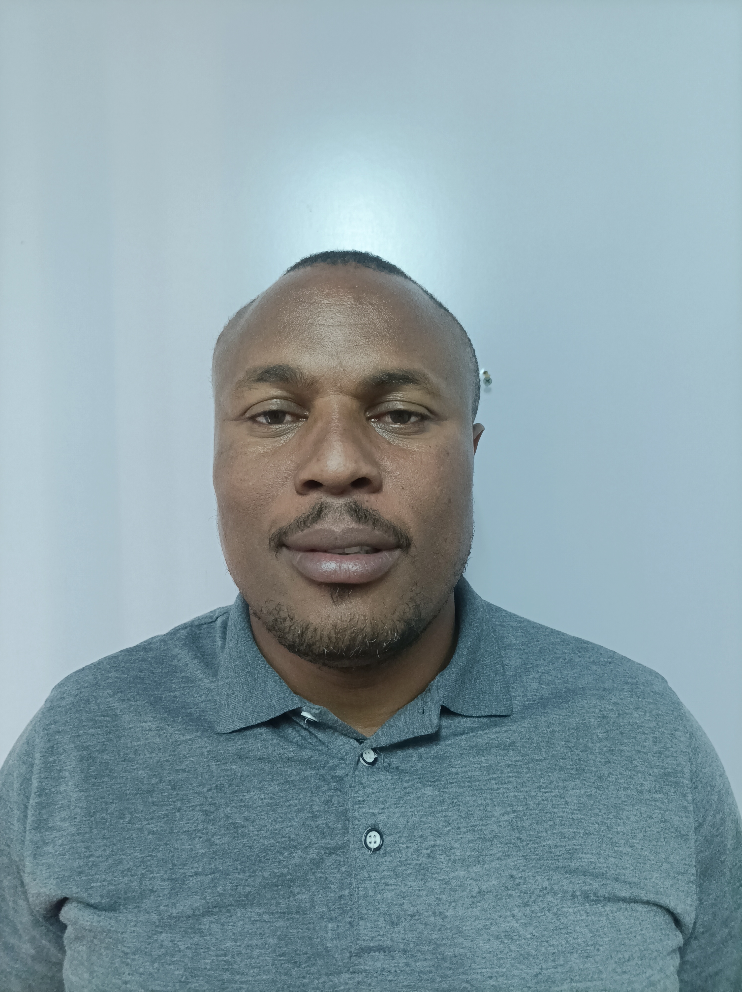 JOHN MWAKALE